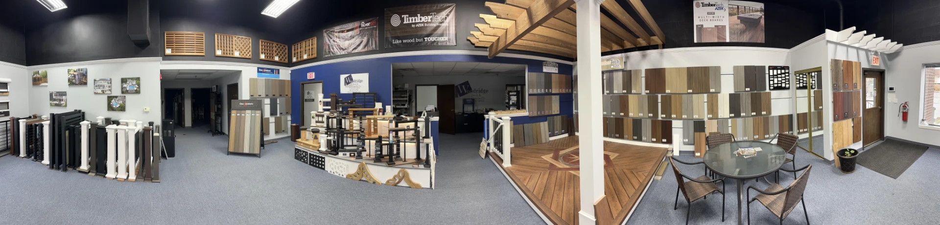 Panorama of the woodridge showroom with a large variety of rail and decking samples