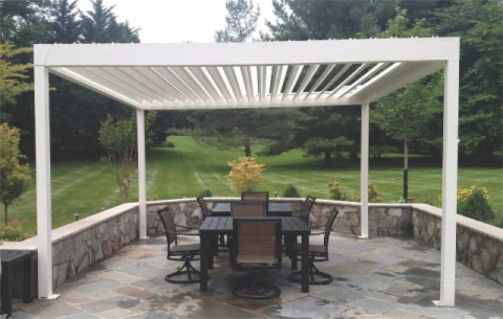 White pergola with outdoor furniture featuring nature view in schaumburg il